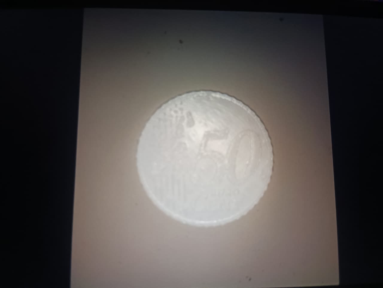 A freshly 3D printed coin